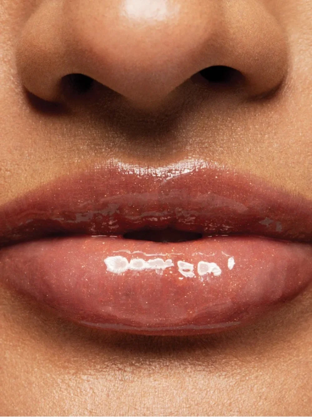 Almay Shimmering Peach-Coral Color & Care Lip Gloss